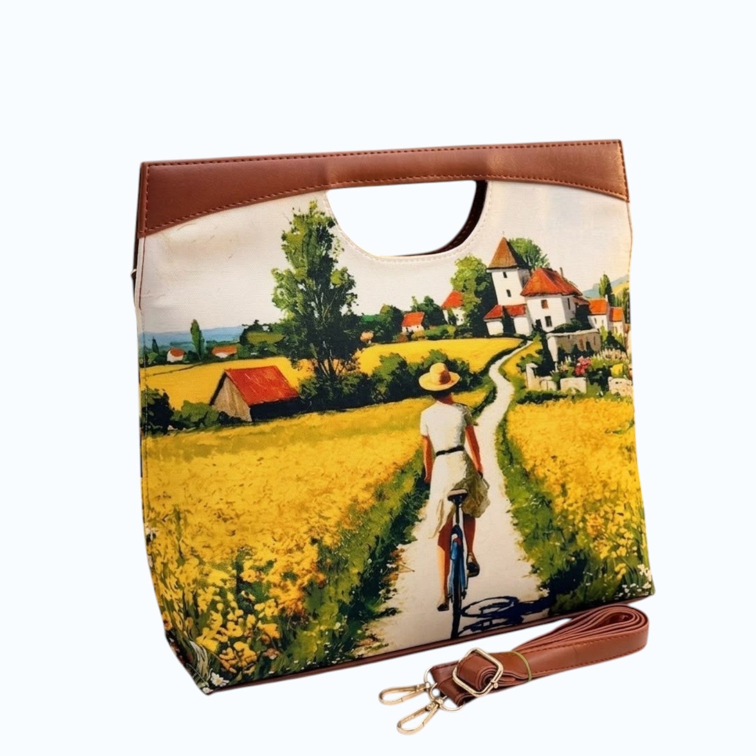 My Store K/C The Cut Satchel handbag featuring a vibrant countryside landscape print with faux leather trim and strap.