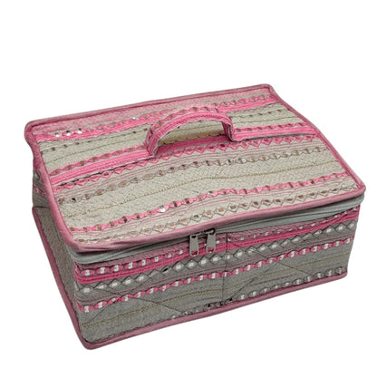 My Store rectangular vanity storage case in neutral fabric with pink trim, intricate embroidery, and mirror-work detail.
